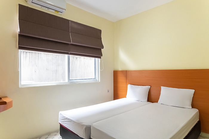 W1 - Standard Twin Daily - Family Guest House Kupang Baru at Twospaces